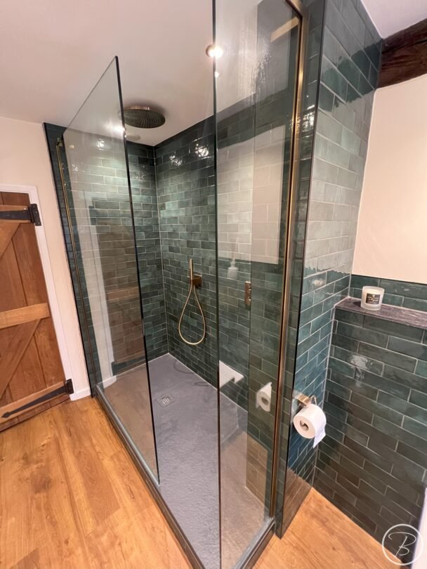 Ceiling shot of full height shower enclosure