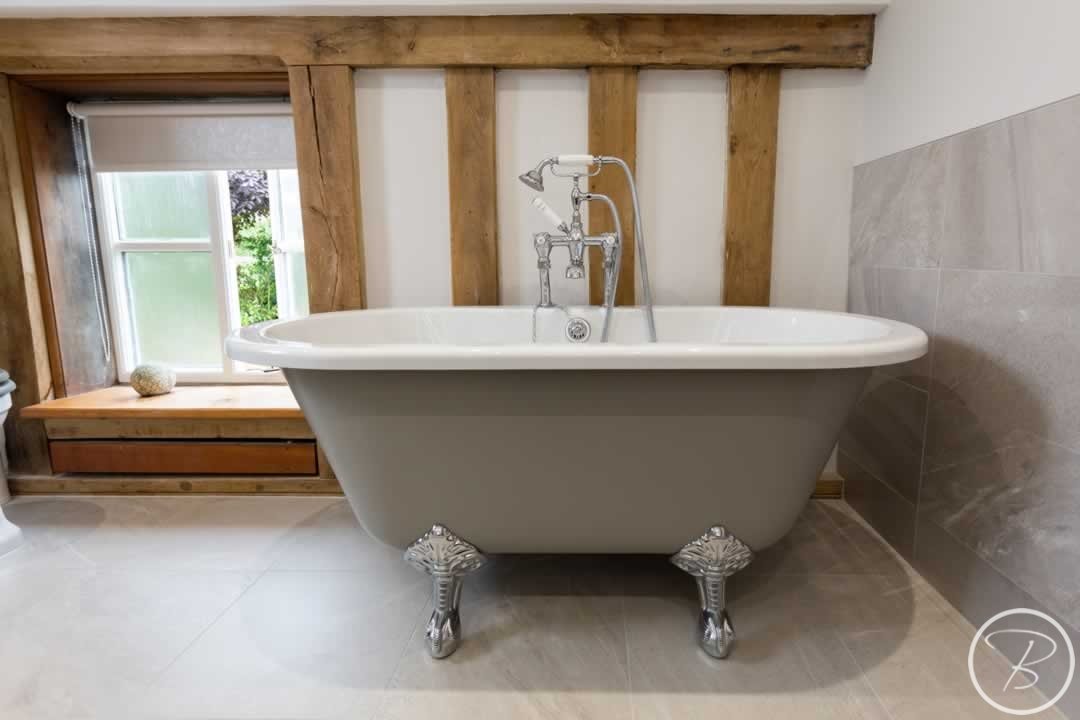 Bath at Bathroom in Great Ashfield by Baytree Bathrooms